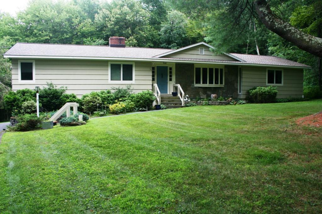 253 Peck Hill Road Woodbridge, CT 06525 - Photo 1 of 1 Beautiful stone front ranch with wood ANDERSON replacement windows throughout!