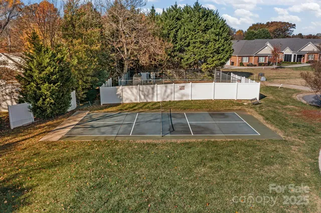 an aerial view of a house with a ocean view