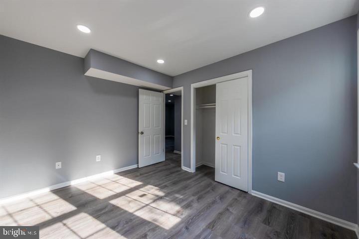 2055 38th Street Southeast, Unit 102 Washington, DC 20020 - Photo 2 of 7 a bathroom with a sink and a mirror
