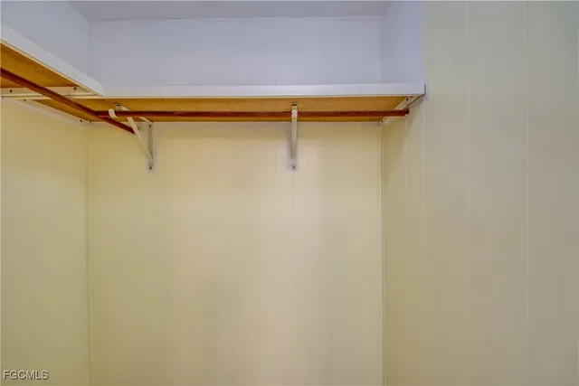 a bathroom with a double vanity sink mirror and