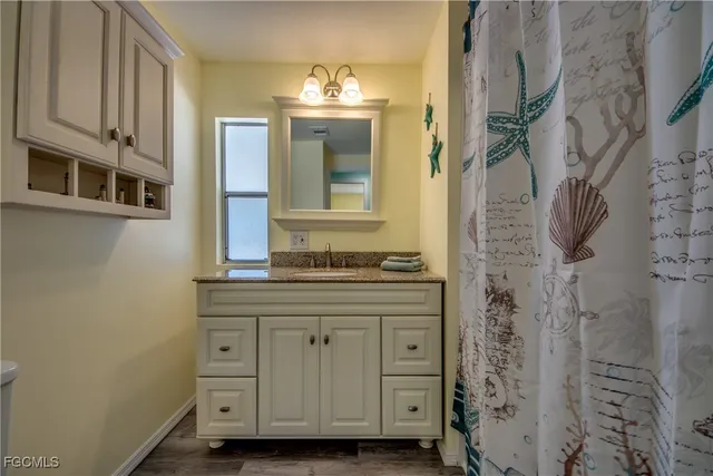 a view of a living room and dining room