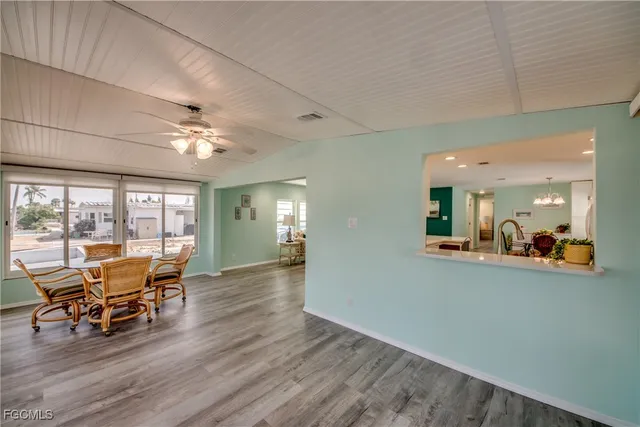 a view of a hallway with a outdoor space