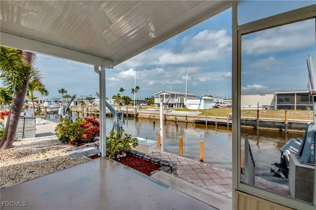 a view of a swimming pool with a patio