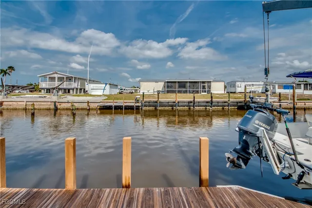 a view of a balcony with chairs