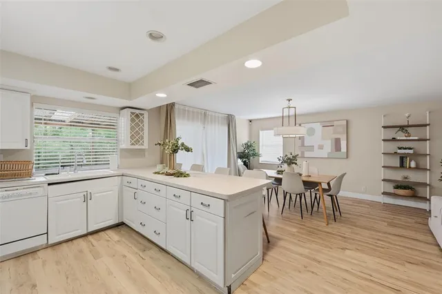 a view of kitchen with breakfast area