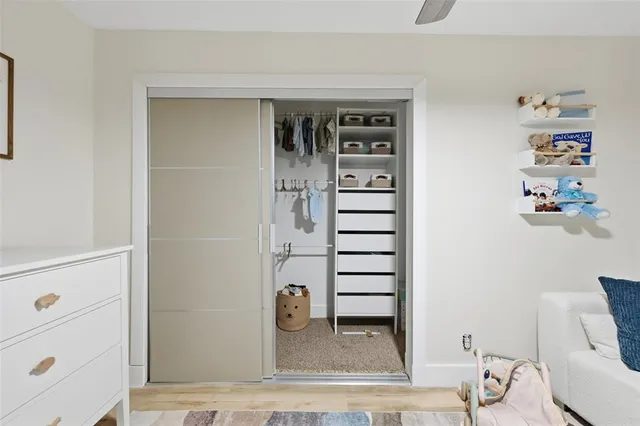 a view of wooden floor and closet