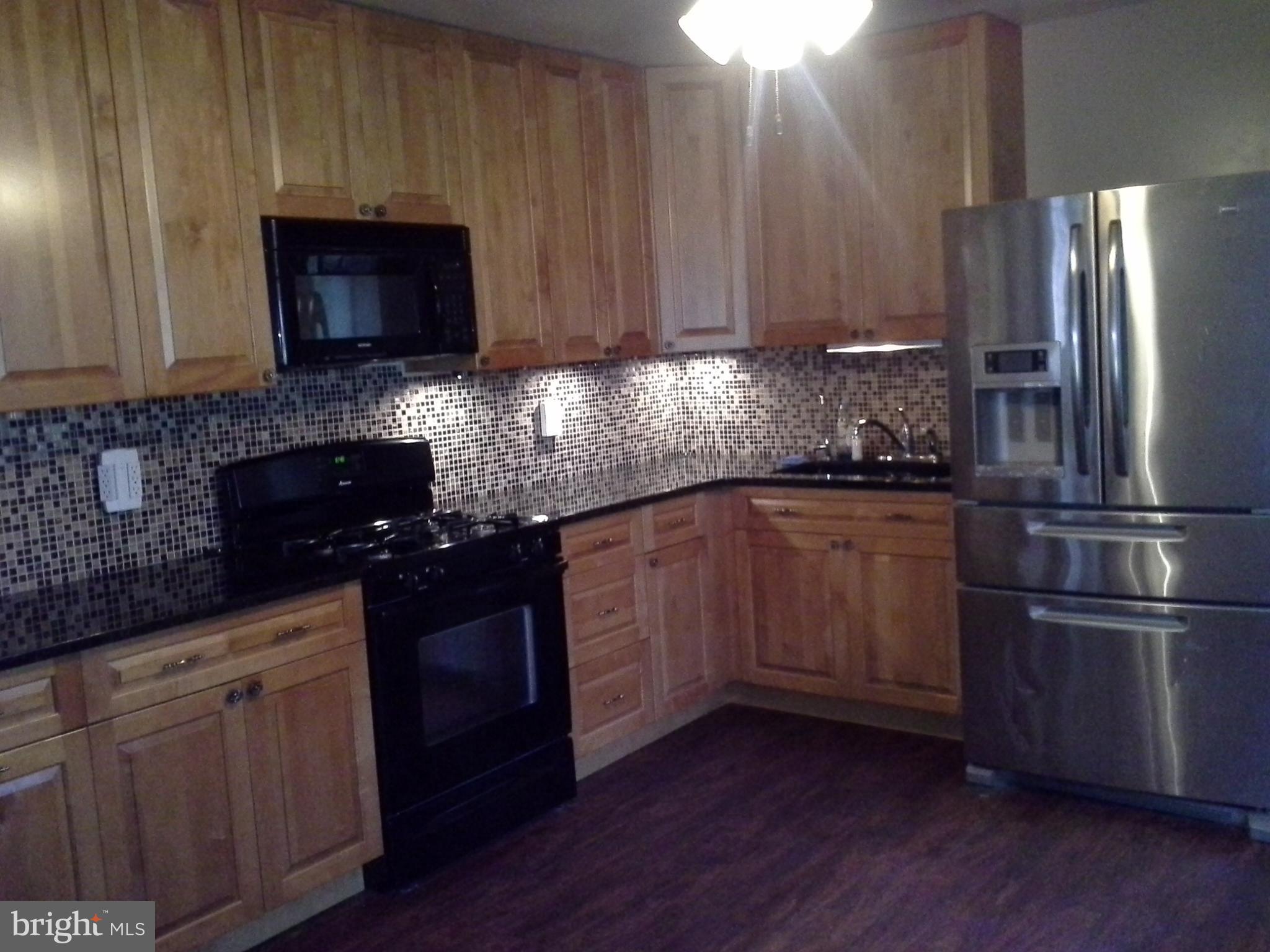 1876 Appleton Road Elkton, MD 21921 - Photo 8 of 24 CUTOM KITCHEN WITH TOP QUALITY CABINETS STONE TOP