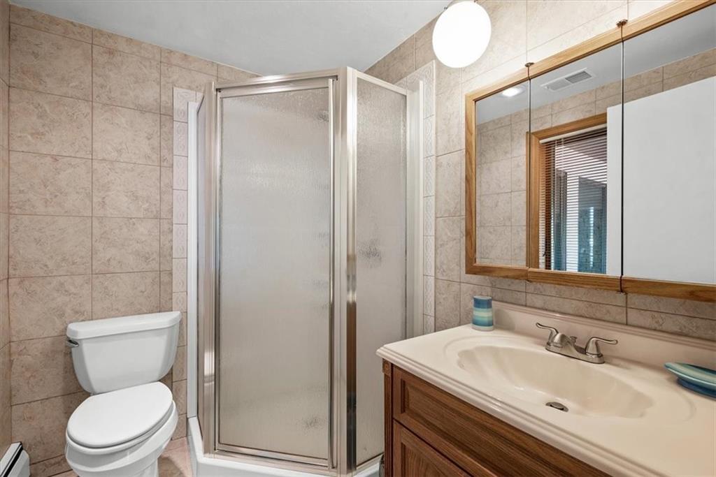 3616 New Texas Road Pittsburgh, PA 15239 - Photo 16 of 25 a bathroom with a sink a toilet and shower