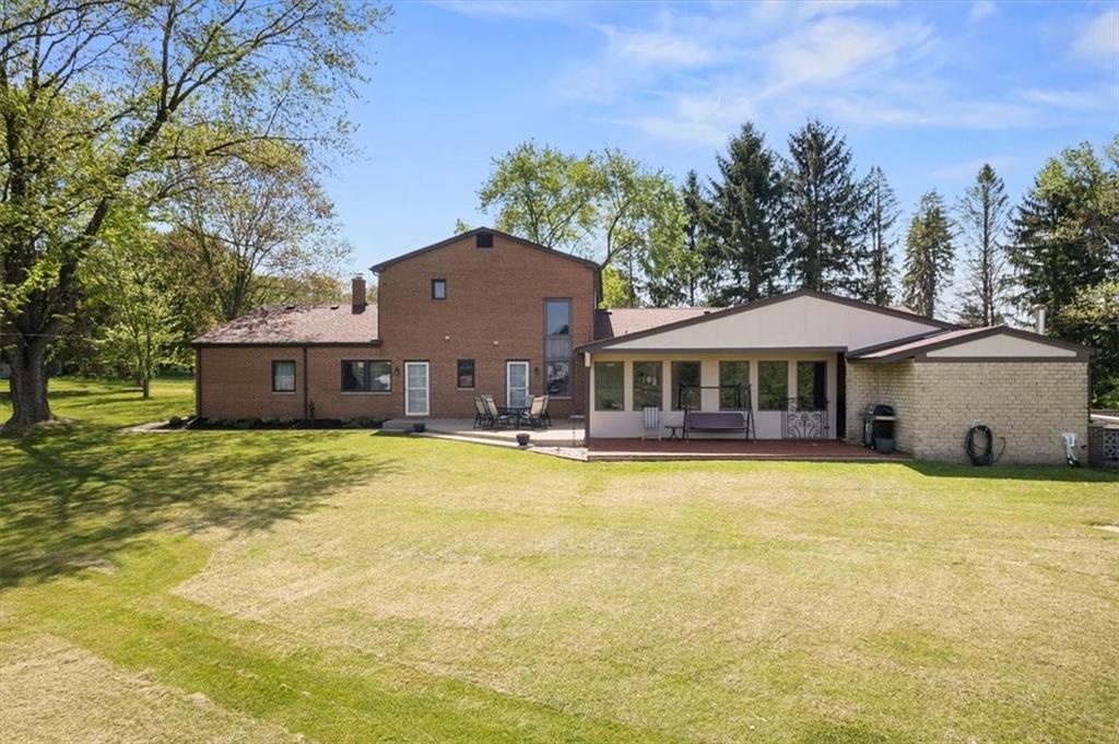 3616 New Texas Road Pittsburgh, PA 15239 - Photo 2 of 25 a front view of a house with a yard