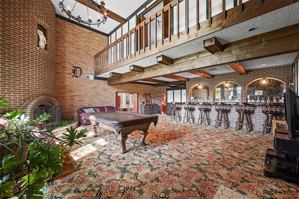 3616 New Texas Road Pittsburgh, PA 15239 - Photo 3 of 25 a table and chairs in front of a building