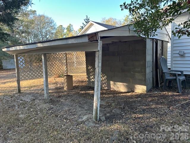 2073 State Rd S-28-522 Bethune, SC 29009 - Photo 5 of 14 a backyard of a house