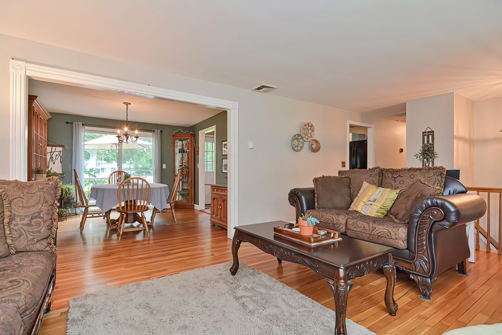23 Carpenter Road Northbridge, MA 01588 - Photo 11 of 38 a living room with furniture and a large window