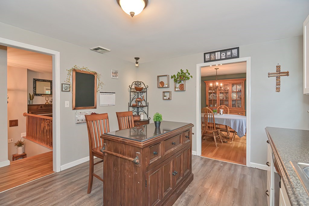 23 Carpenter Road Northbridge, MA 01588 - Photo 19 of 38 a dining room with furniture and wooden floor