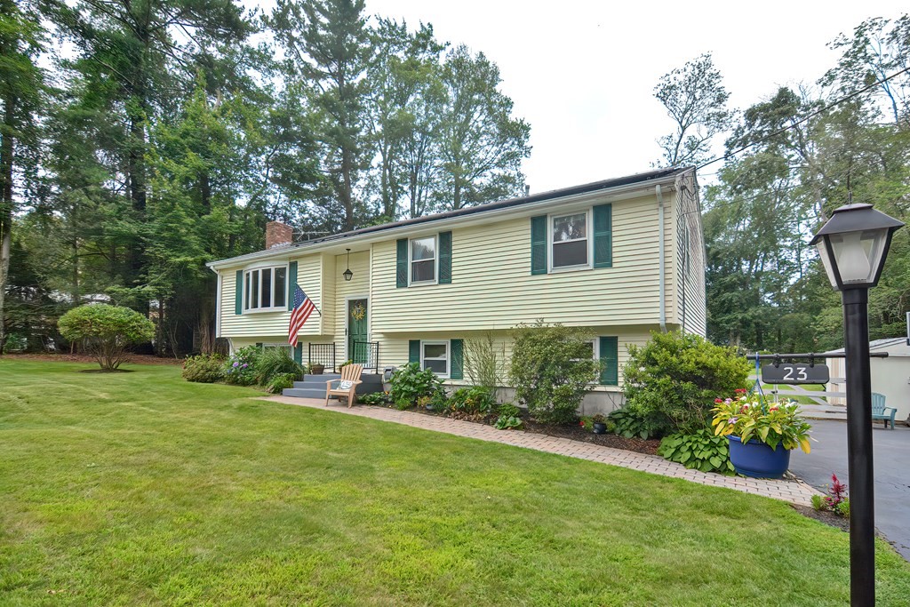 23 Carpenter Road Northbridge, MA 01588 - Photo 2 of 38 a front view of house with yard and green space