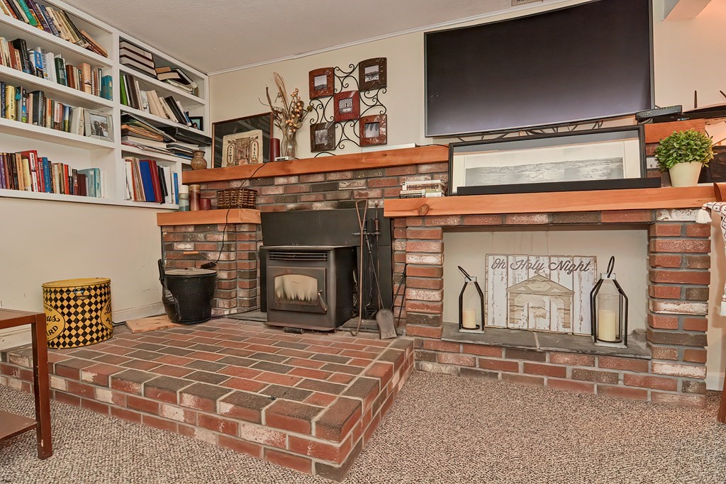 23 Carpenter Road Northbridge, MA 01588 - Photo 34 of 38 a view of a livingroom with fireplace and furniture