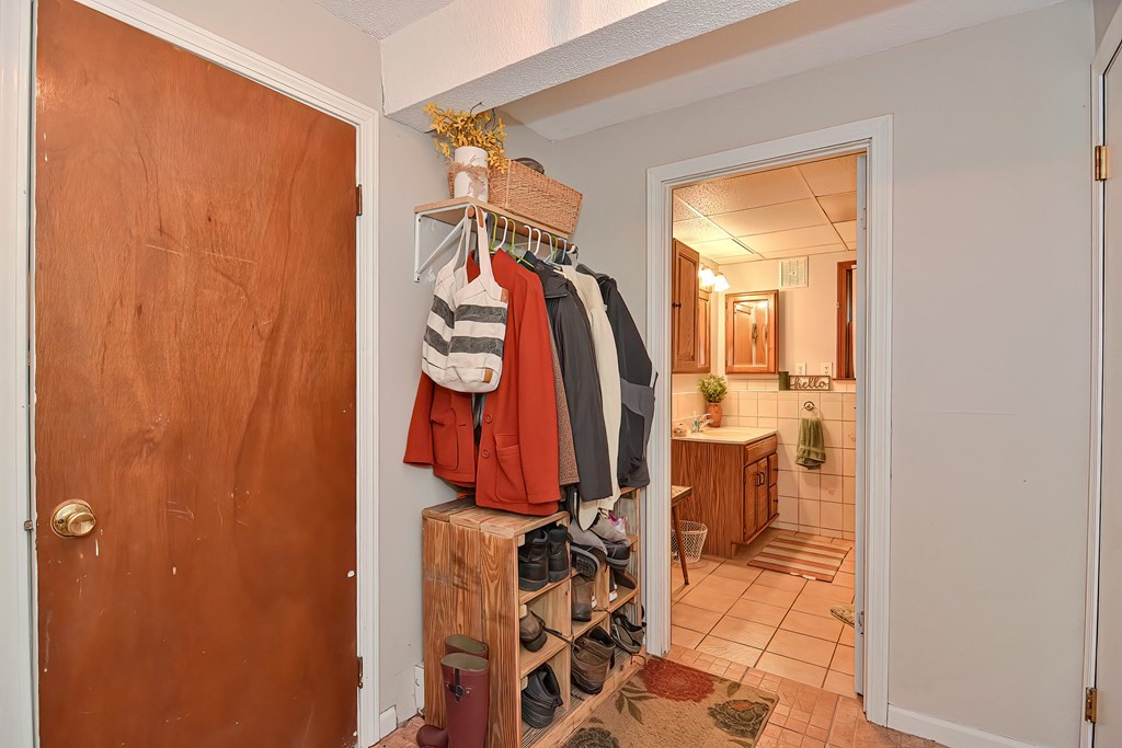 23 Carpenter Road Northbridge, MA 01588 - Photo 35 of 38 a view of walk in closet with clothes