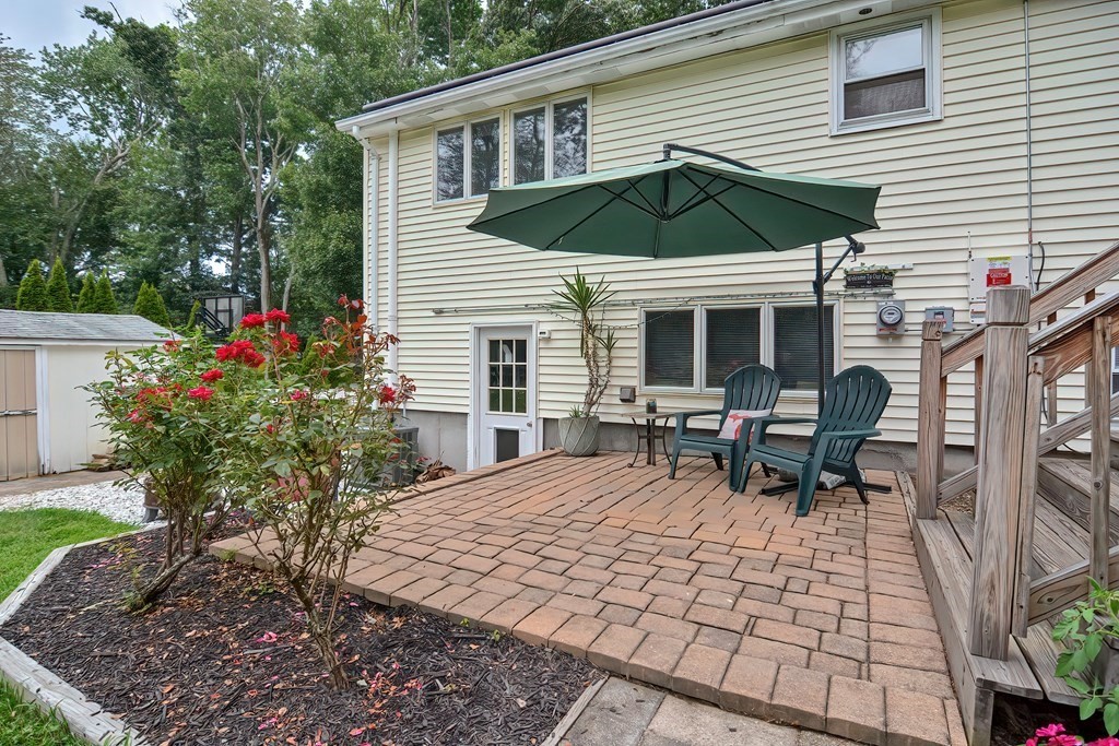 23 Carpenter Road Northbridge, MA 01588 - Photo 5 of 38 a view of a house with patio and a yard