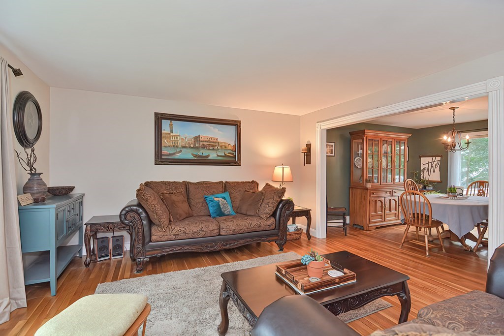 23 Carpenter Road Northbridge, MA 01588 - Photo 10 of 38 a living room with furniture a rug and a table