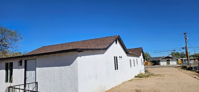a view of a house with a street