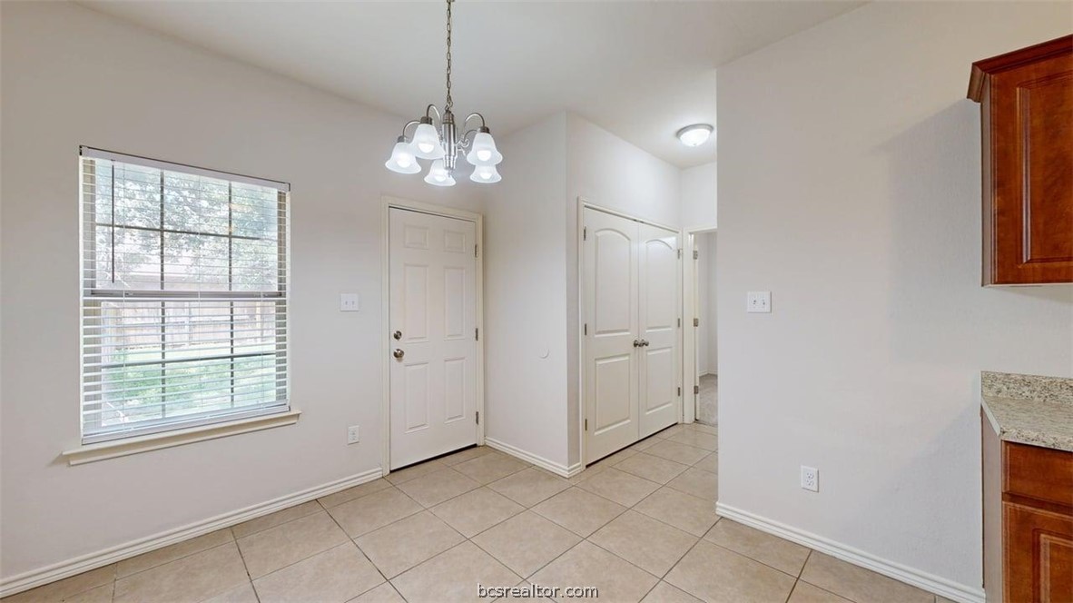 4453-4455 Reveille Road College Station, TX 77845 - Photo 27 of 37 an empty room with windows and entrance
