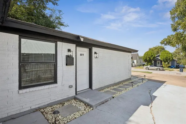 a front view of a house with a garage