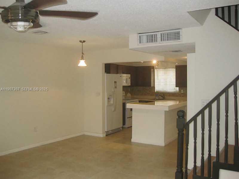 3321 Farragut Street, Unit 7A Hollywood, FL 33021 - Photo 3 of 8 a view of a kitchen with a sink