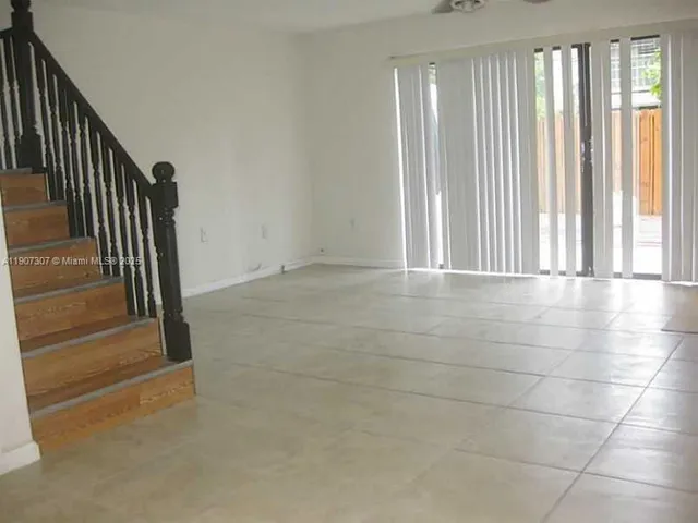 a view of entryway with stairs