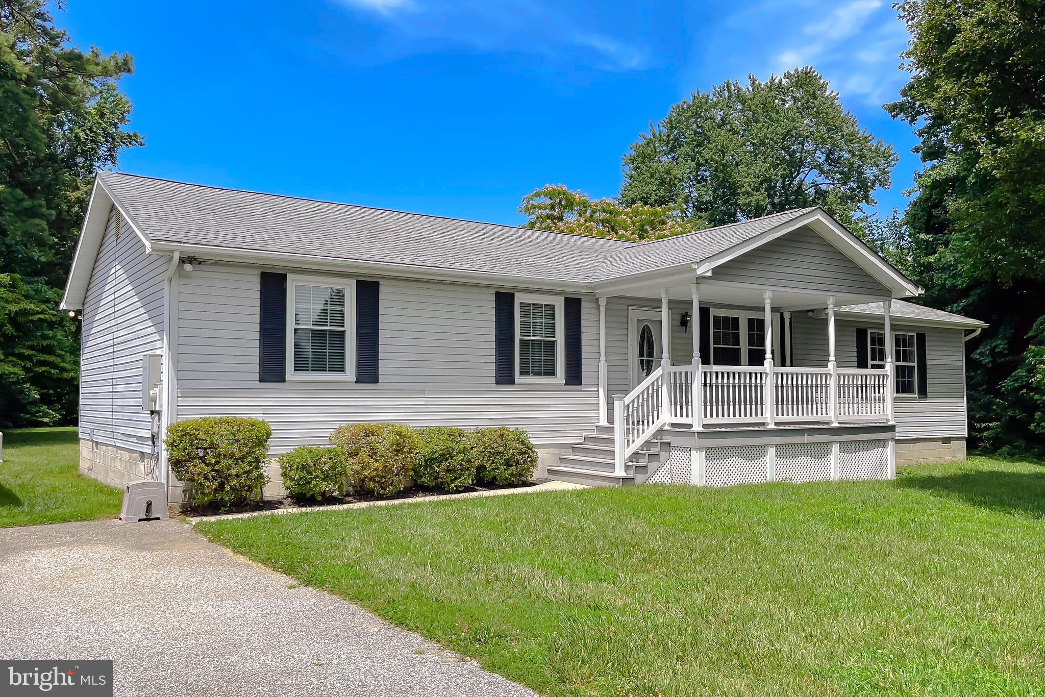 29799 Allen Road Mechanicsville, MD 20659 - Photo 1 of 49 a front view of a house with a yard