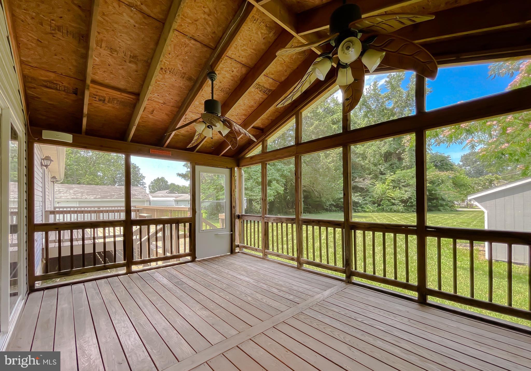 29799 Allen Road Mechanicsville, MD 20659 - Photo 19 of 49 a view of a balcony with wooden floor