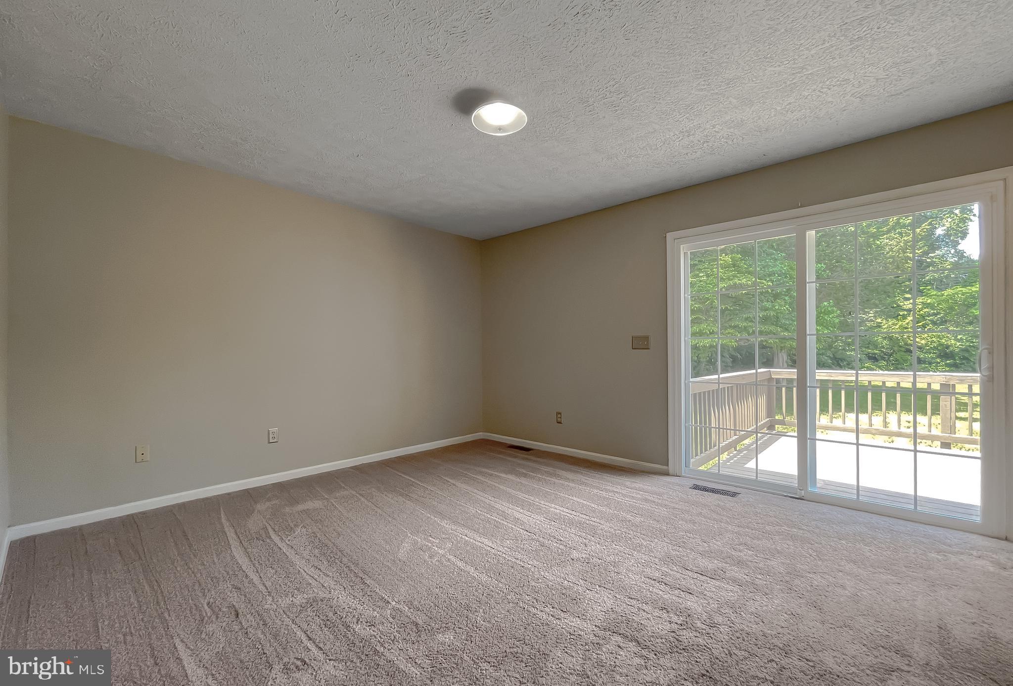 29799 Allen Road Mechanicsville, MD 20659 - Photo 20 of 49 a view of an empty room with a window