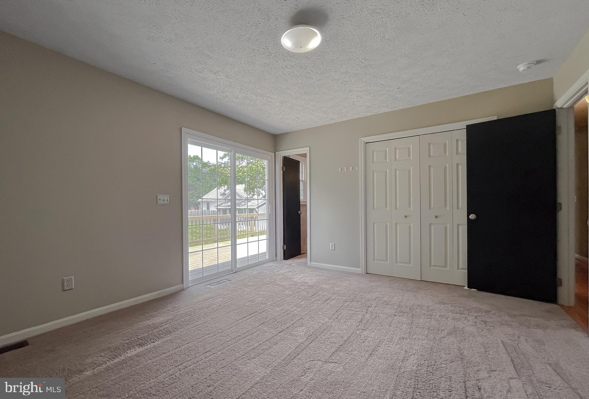 29799 Allen Road Mechanicsville, MD 20659 - Photo 22 of 49 a view of an empty room with a window