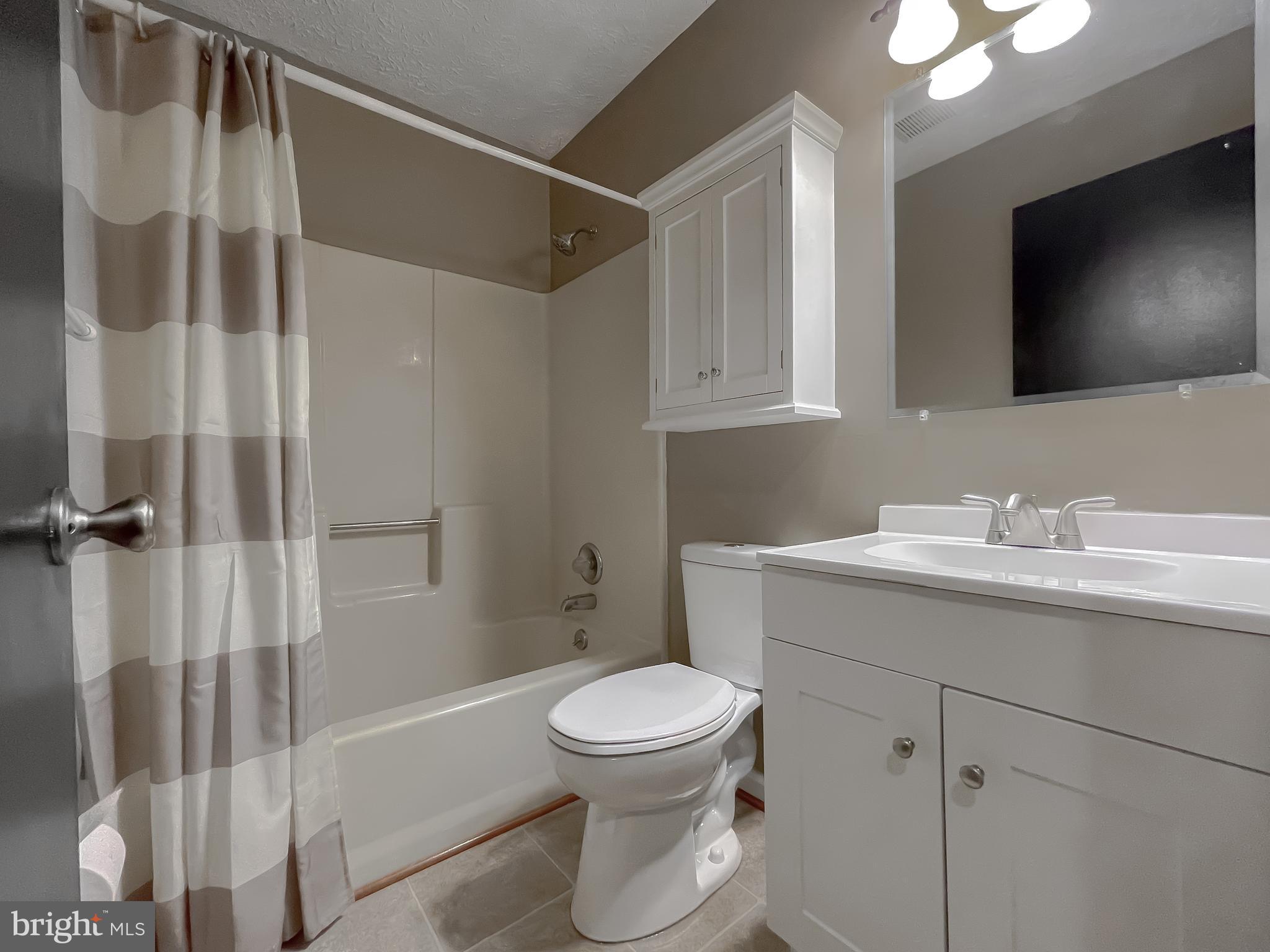 29799 Allen Road Mechanicsville, MD 20659 - Photo 28 of 49 a bathroom with a sink toilet and shower