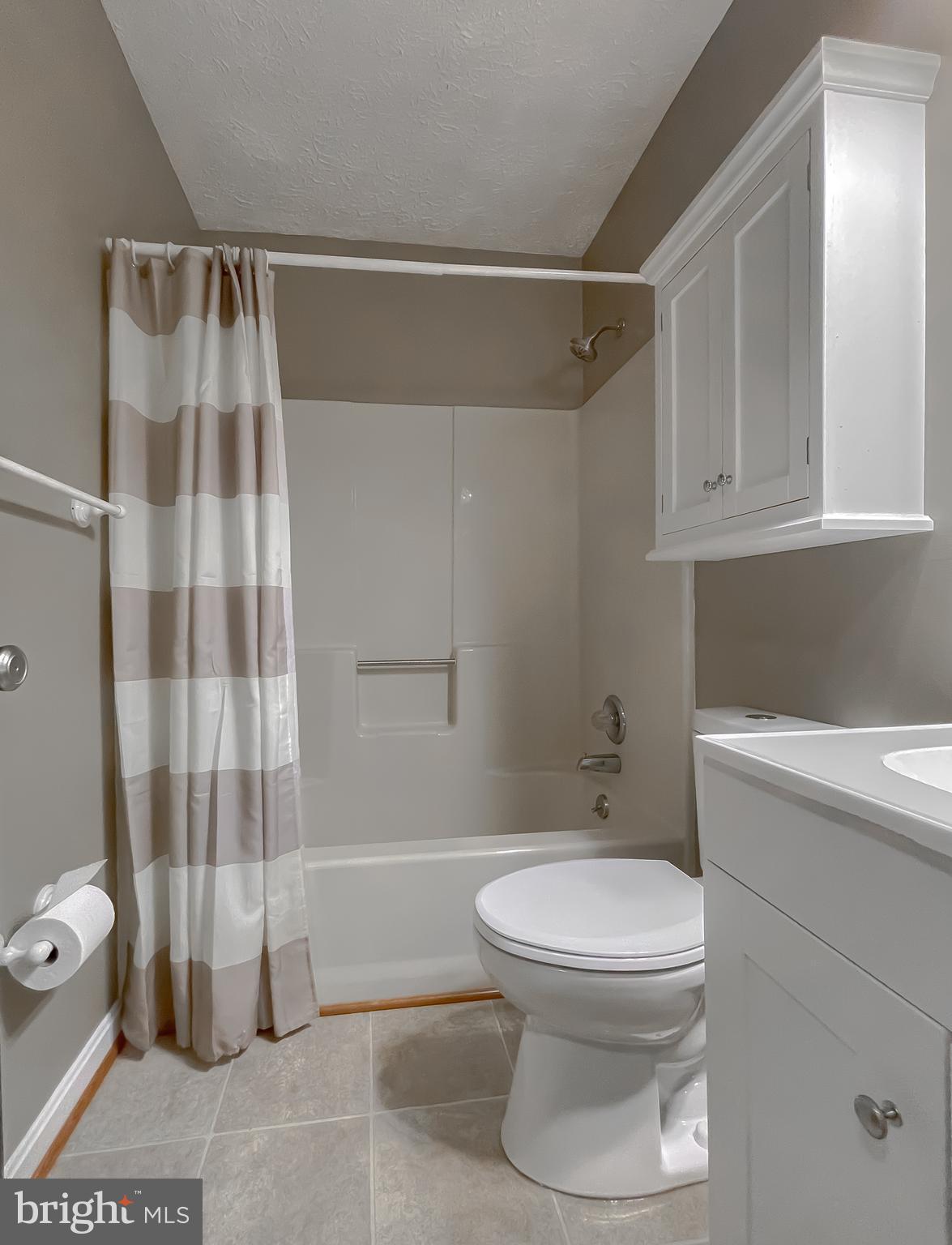 29799 Allen Road Mechanicsville, MD 20659 - Photo 29 of 49 a bathroom with a toilet and shower