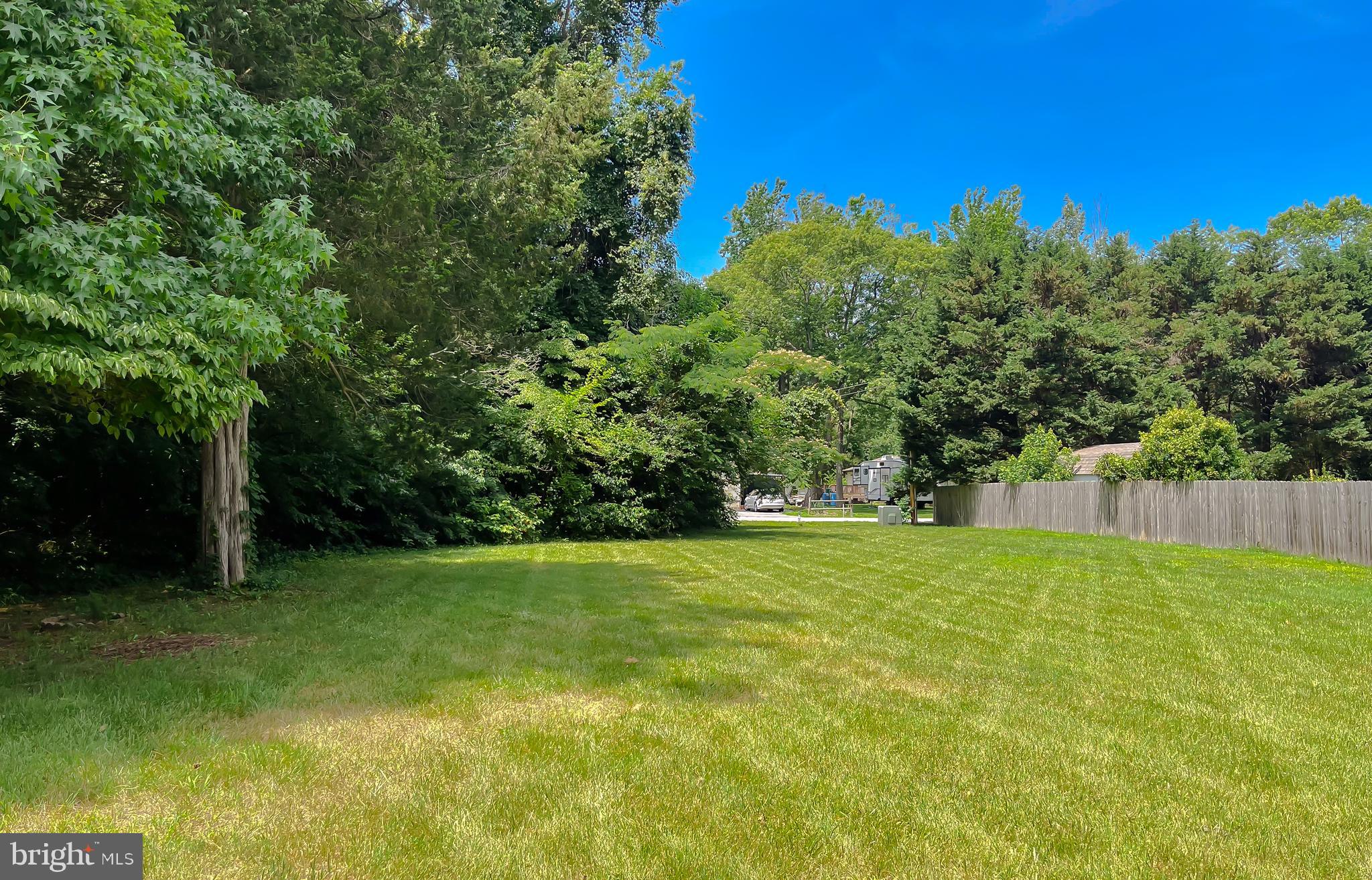 29799 Allen Road Mechanicsville, MD 20659 - Photo 33 of 49 a view of a yard with a house in the background