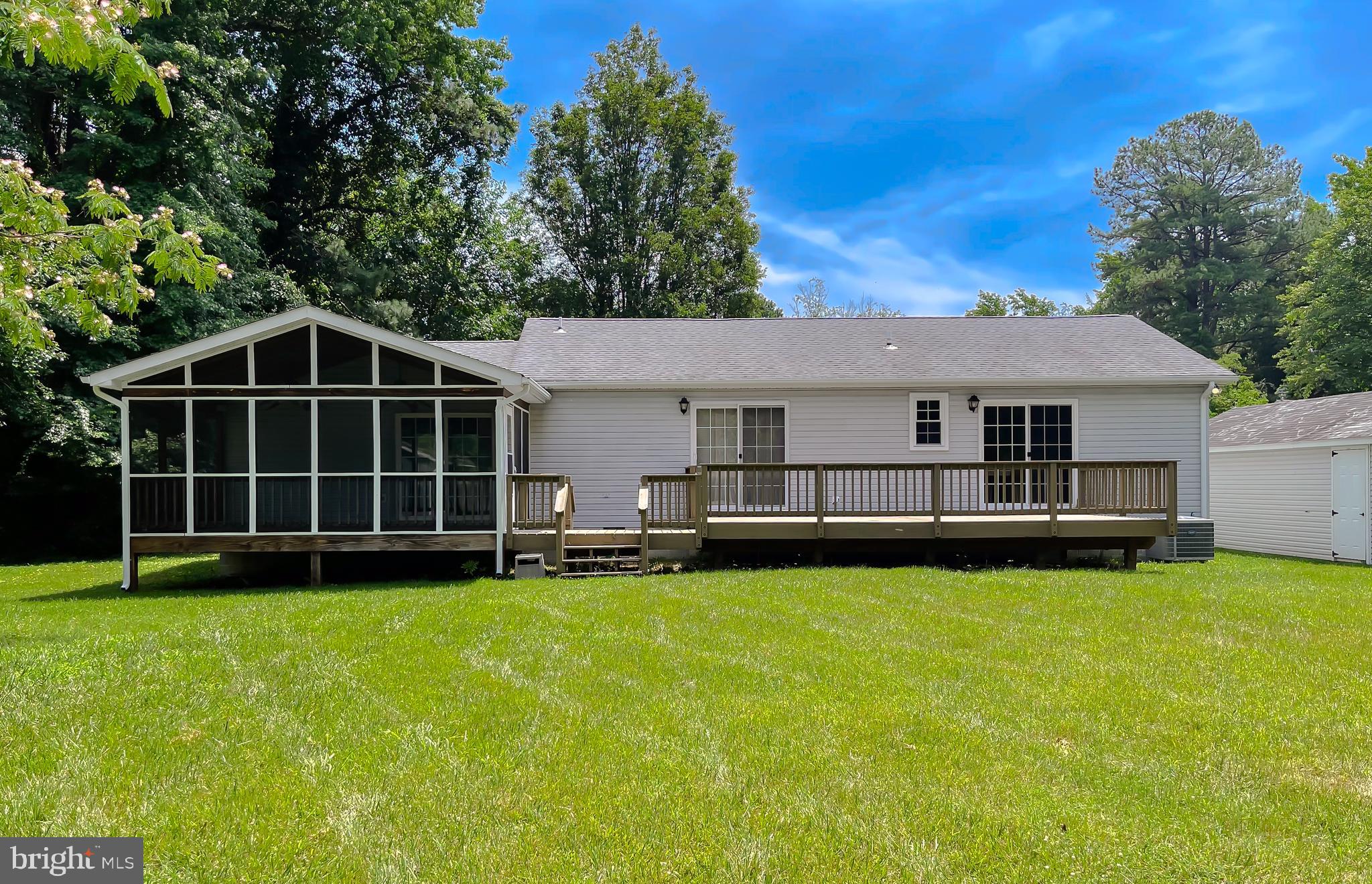 29799 Allen Road Mechanicsville, MD 20659 - Photo 37 of 49 a view of a house with a yard and sitting area