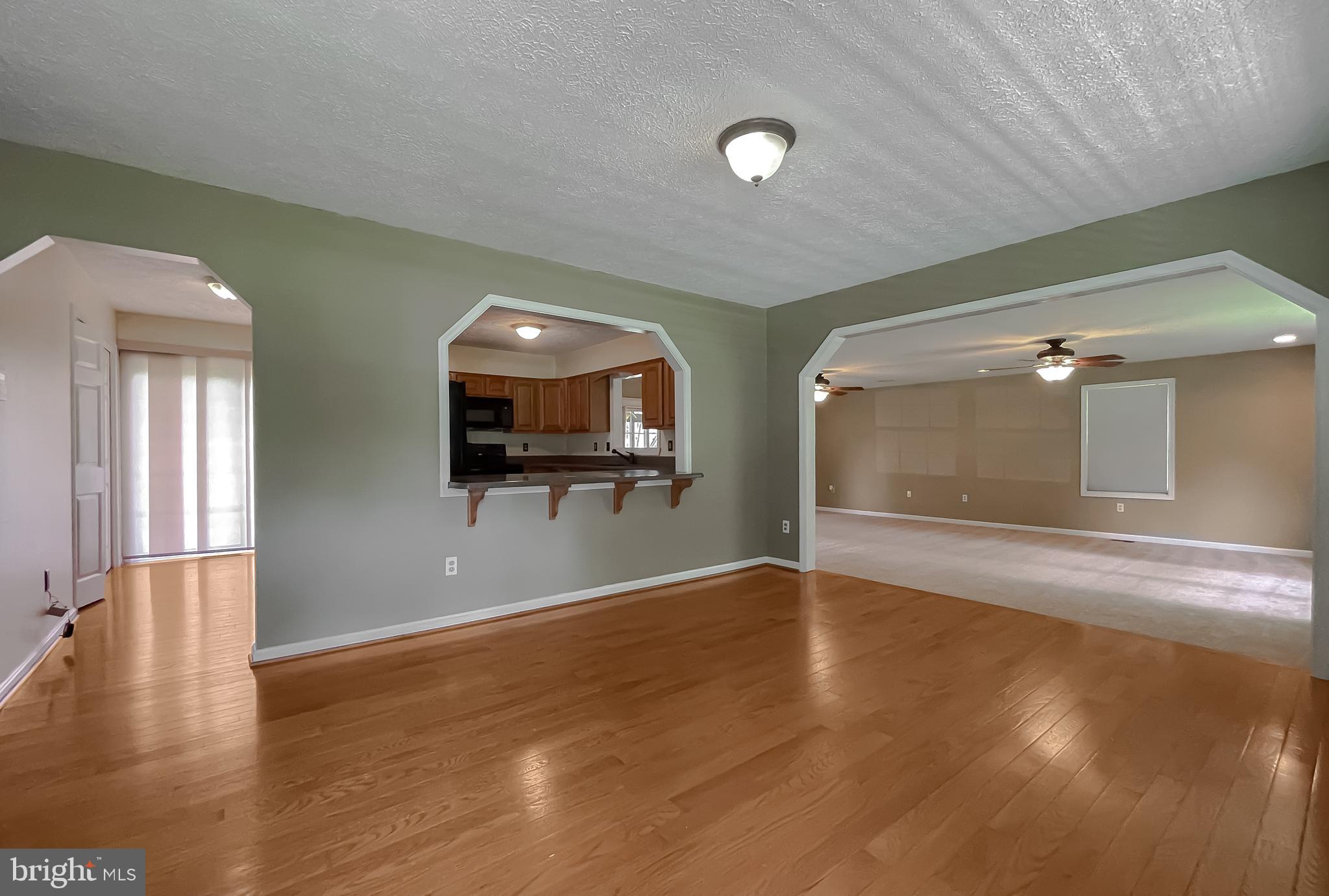 29799 Allen Road Mechanicsville, MD 20659 - Photo 5 of 49 a view of a livingroom with wooden floor