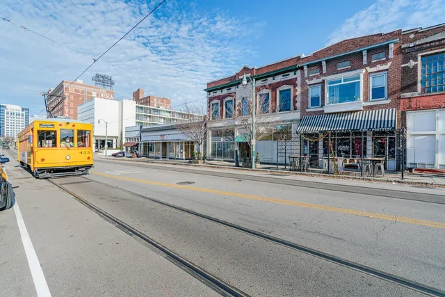 a view of street with parked cars