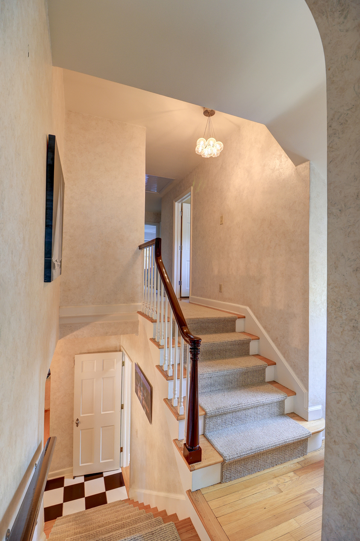411 West 13th Street Sterling, IL 61081 - Photo 18 of 53 a view of staircase with white walls