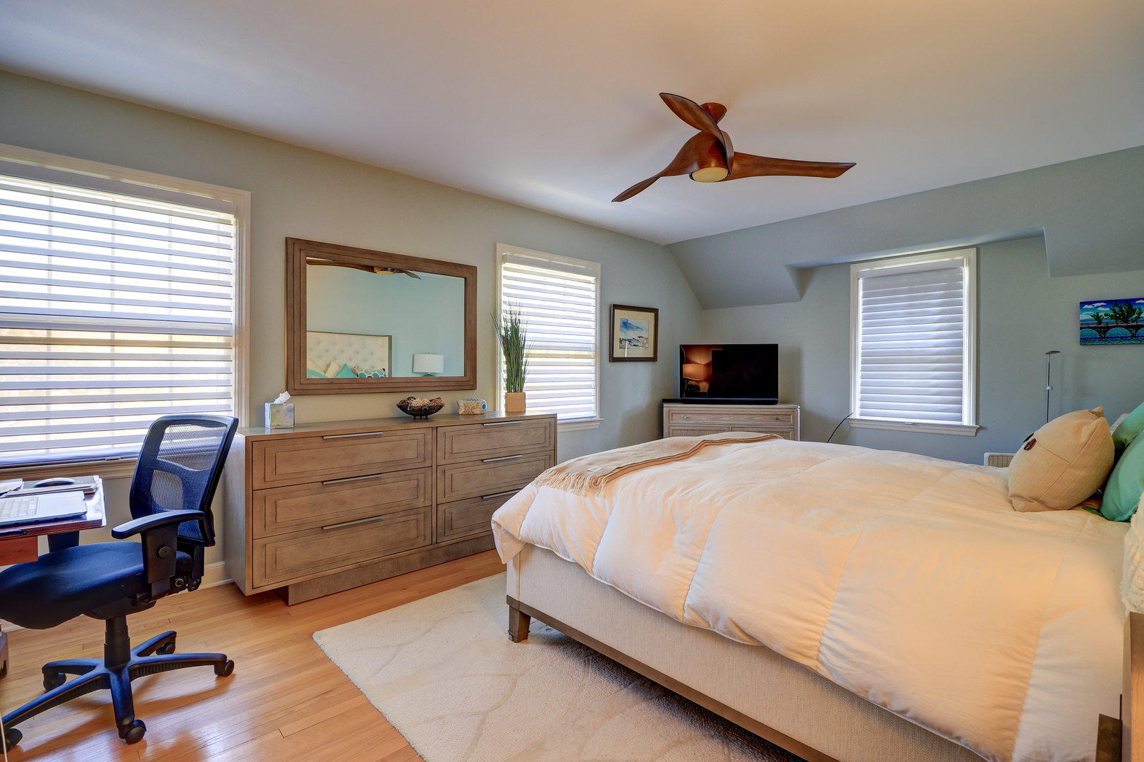 411 West 13th Street Sterling, IL 61081 - Photo 21 of 53 a bedroom with a large bed and a tv