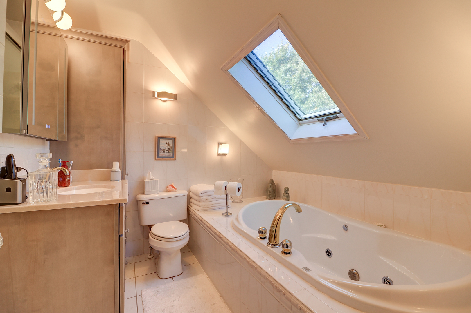 411 West 13th Street Sterling, IL 61081 - Photo 22 of 53 a bathroom with a bathtub sink mirror and toilet