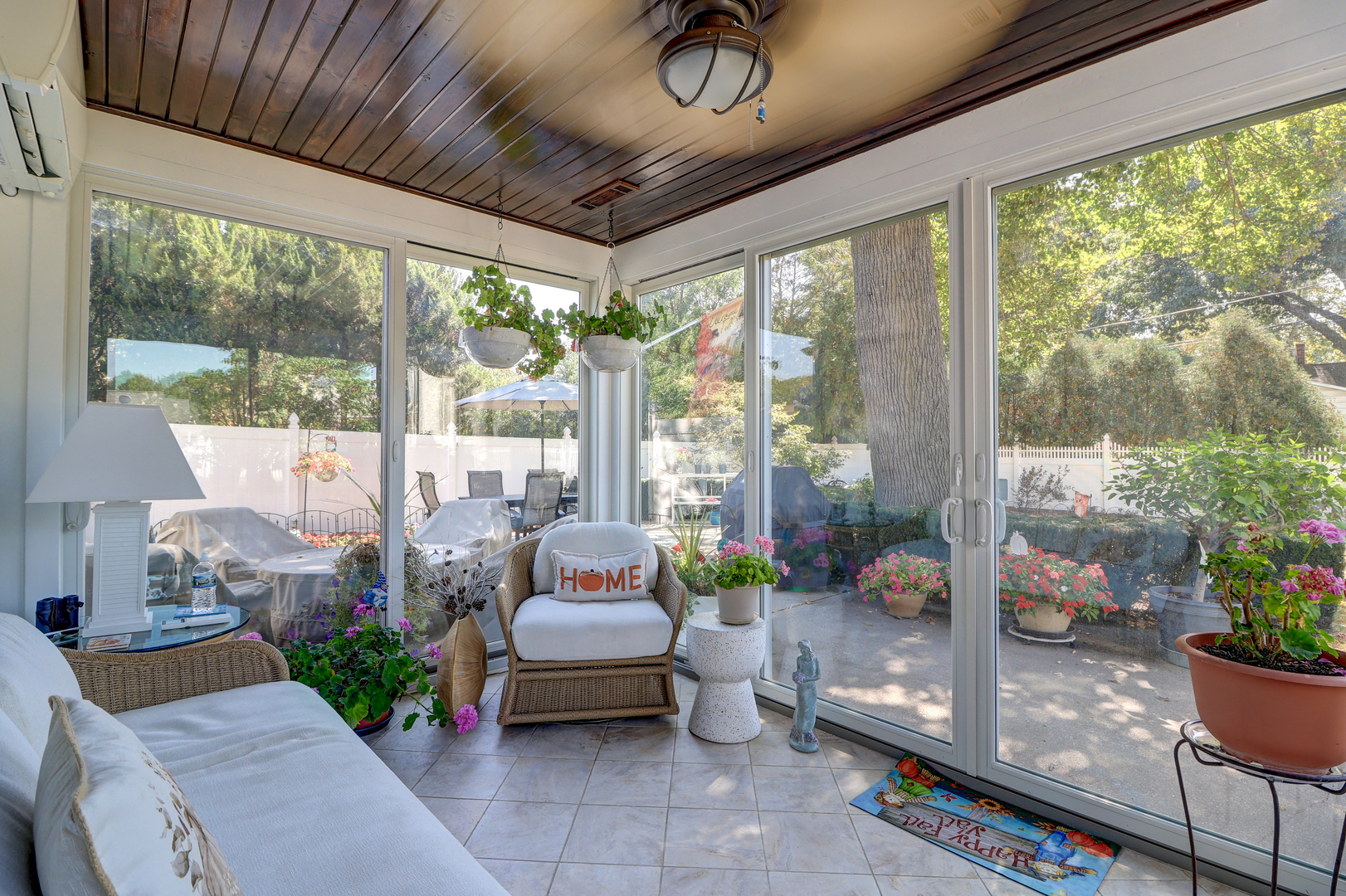 411 West 13th Street Sterling, IL 61081 - Photo 34 of 53 a living room with furniture and a potted plant