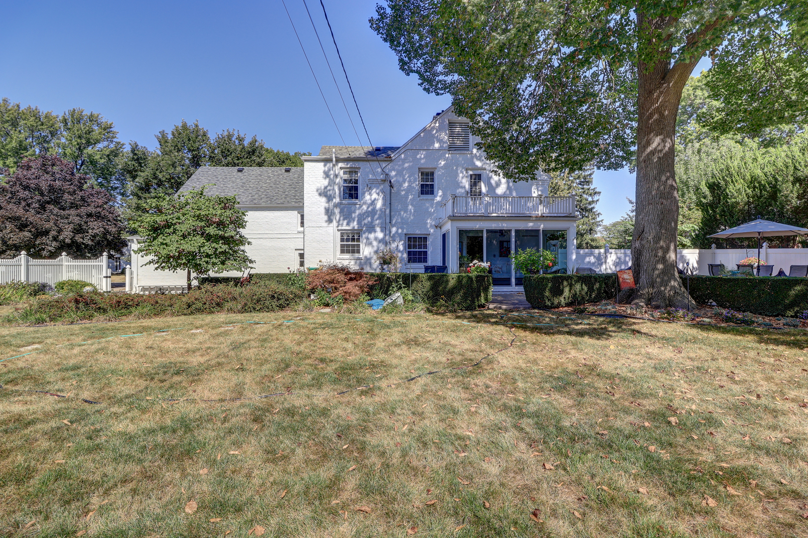 411 West 13th Street Sterling, IL 61081 - Photo 39 of 53 a front view of a house with a yard