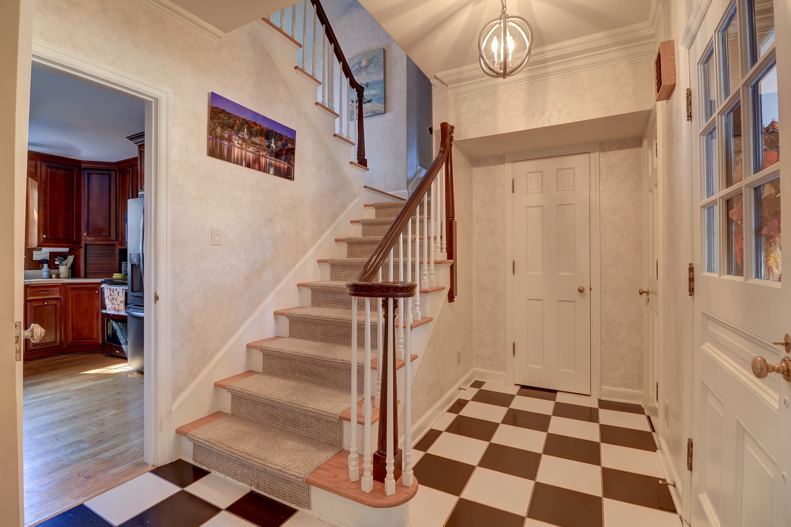 411 West 13th Street Sterling, IL 61081 - Photo 5 of 53 a view of entryway and hall with wooden floor