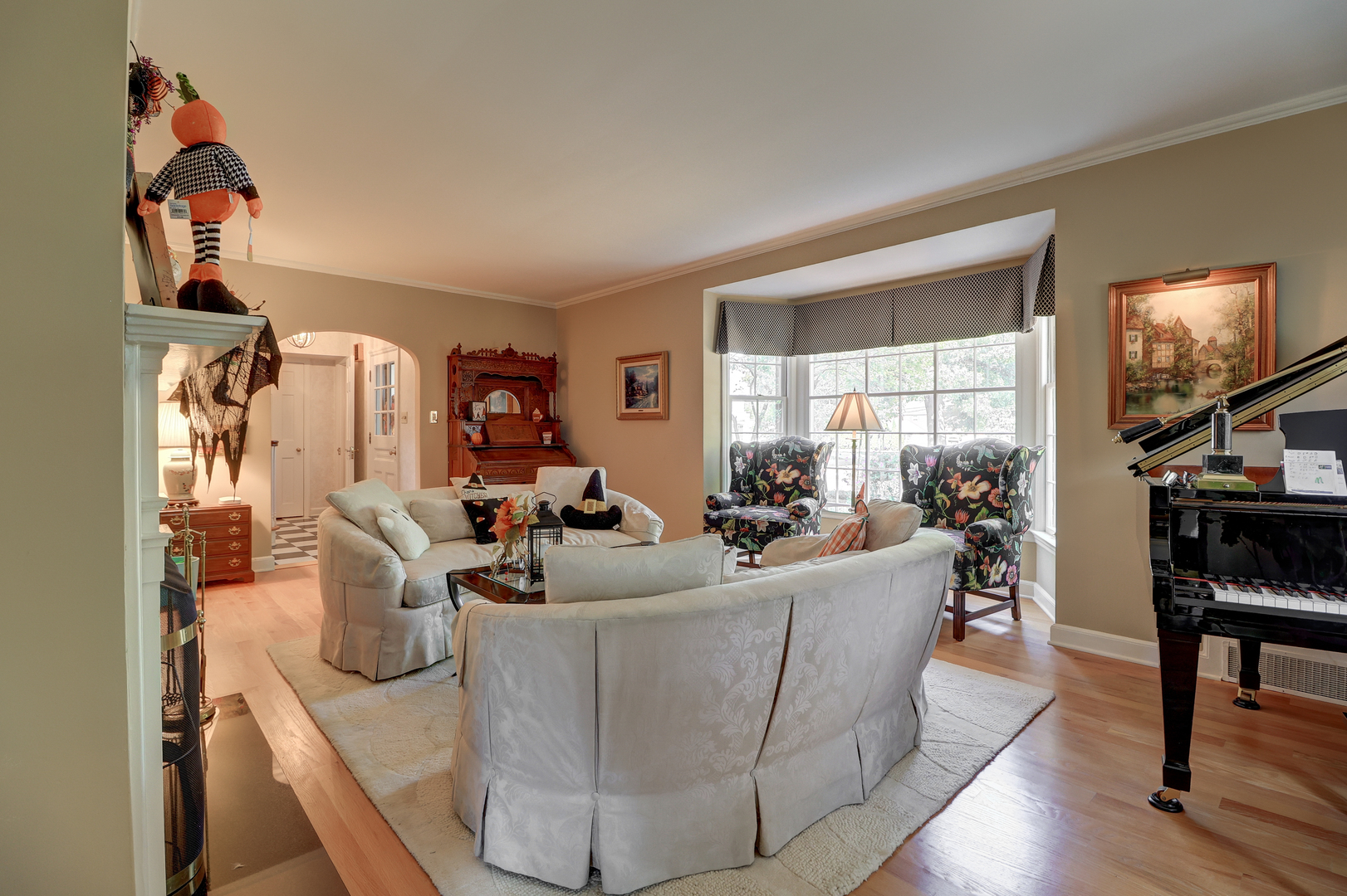 411 West 13th Street Sterling, IL 61081 - Photo 7 of 53 a living room with furniture a window and a flat screen tv