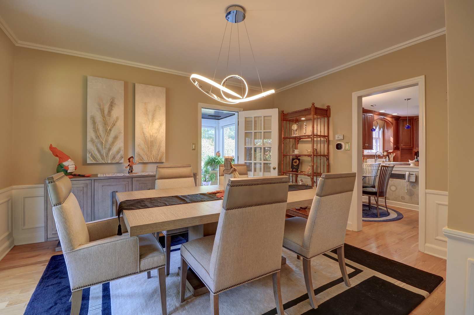 411 West 13th Street Sterling, IL 61081 - Photo 9 of 53 a view of a dining room with furniture window and wooden floor