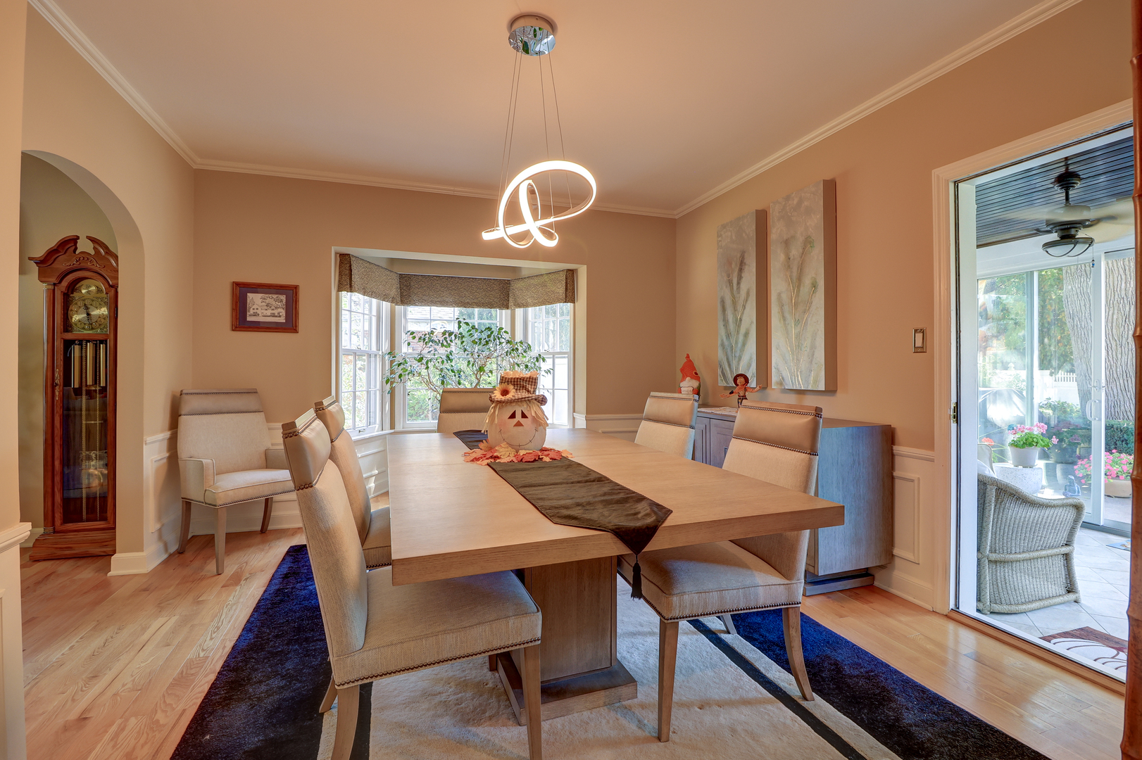 411 West 13th Street Sterling, IL 61081 - Photo 10 of 53 a view of a dining room with furniture window and wooden floor