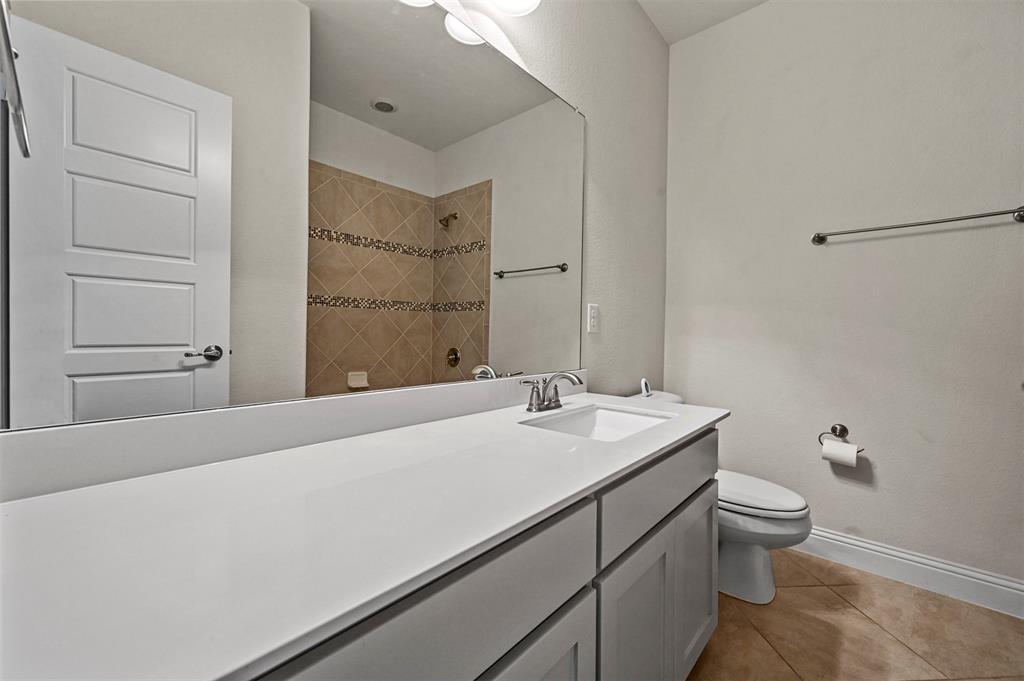 3000 Crestwater Ridge Keller, TX 76248 - Photo 16 of 22 a bathroom with a sink a toilet and shower