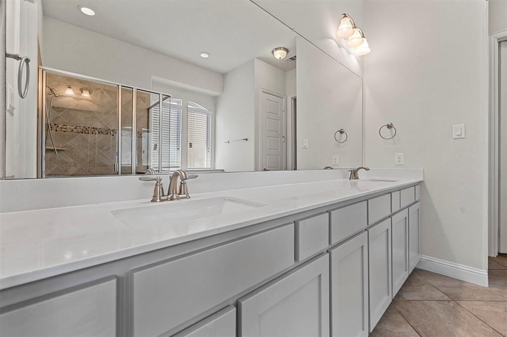 3000 Crestwater Ridge Keller, TX 76248 - Photo 18 of 22 a bathroom with a double vanity sink and a mirror