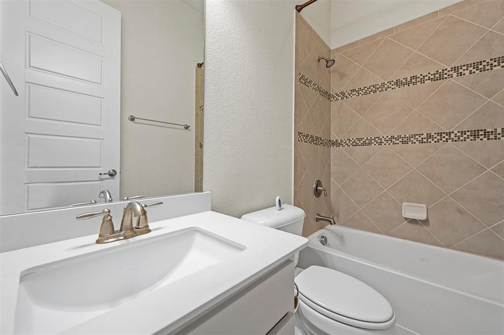 3000 Crestwater Ridge Keller, TX 76248 - Photo 21 of 22 a bathroom with a granite countertop sink toilet and shower