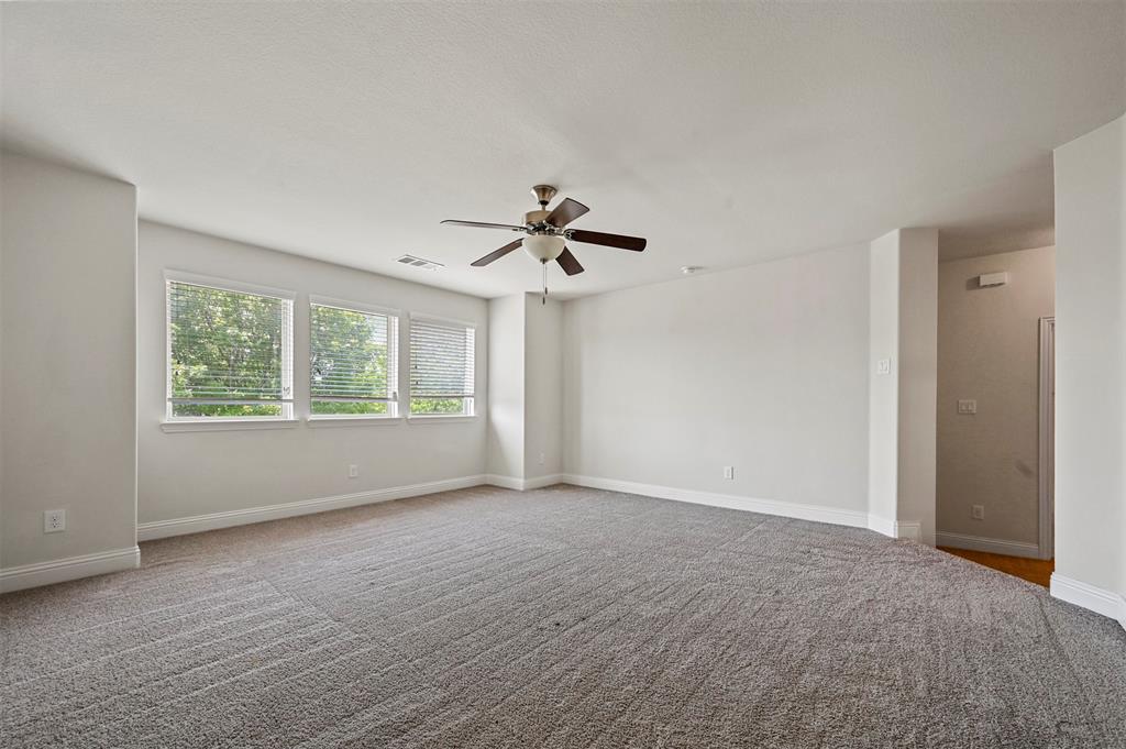 3000 Crestwater Ridge Keller, TX 76248 - Photo 8 of 22 a view of empty room with wooden floor and fan